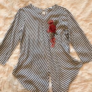 Asymmetrical striped blouse